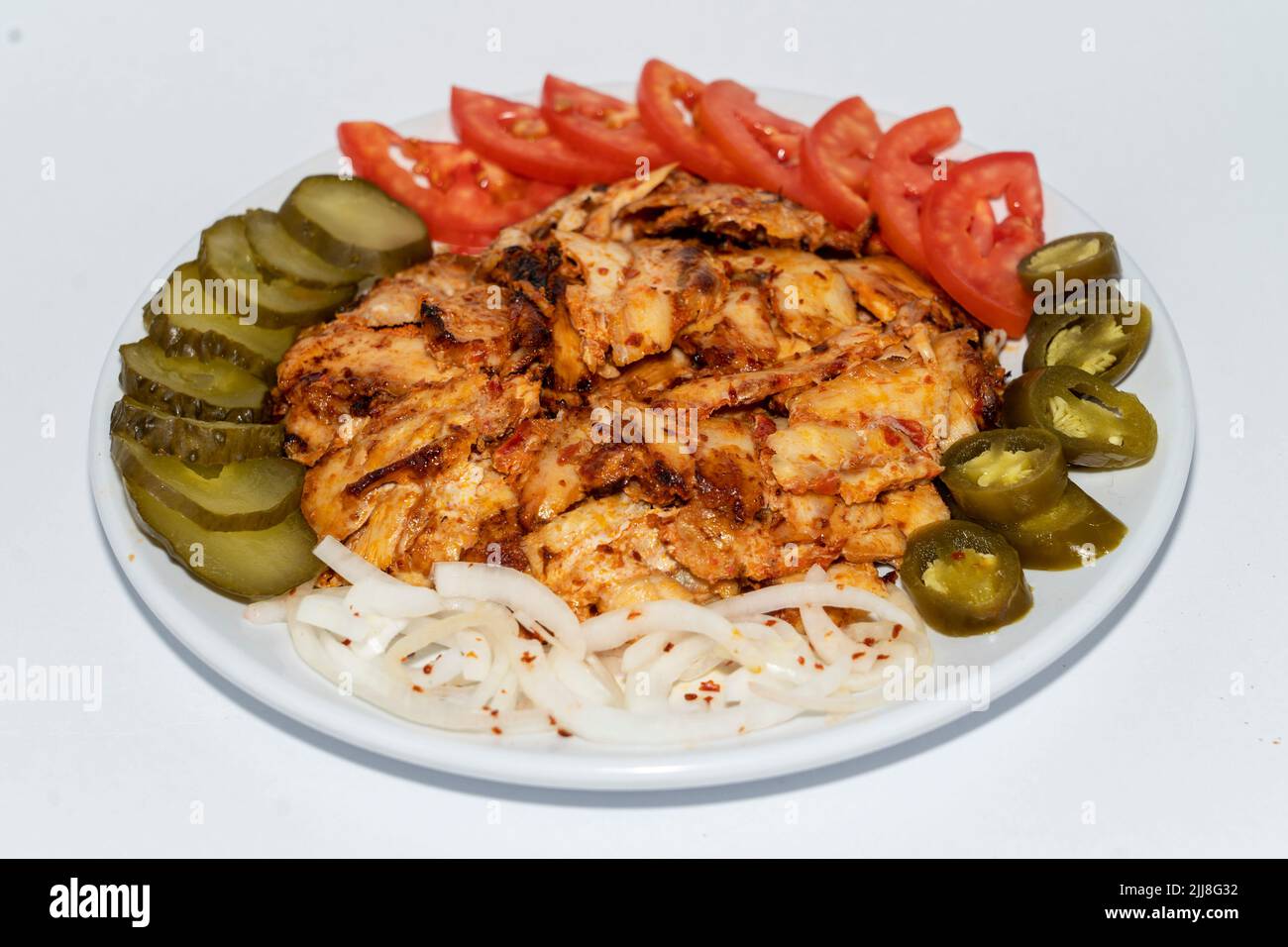 Chicken doner plate in a Restaurant. Isolated. Stock Photo