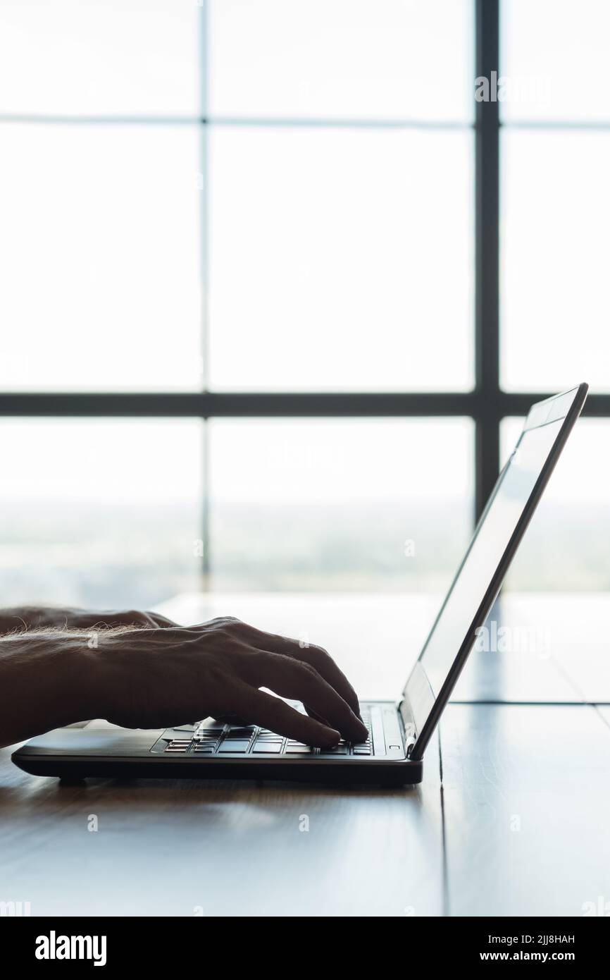freelance app testing remote QA man work laptop Stock Photo Alamy