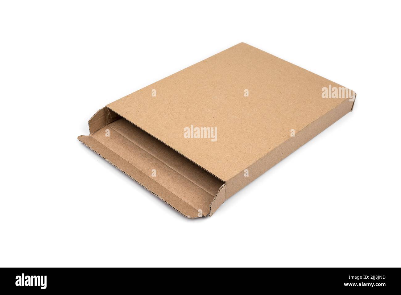 Very narrow cardboard box on a white Stock Photo