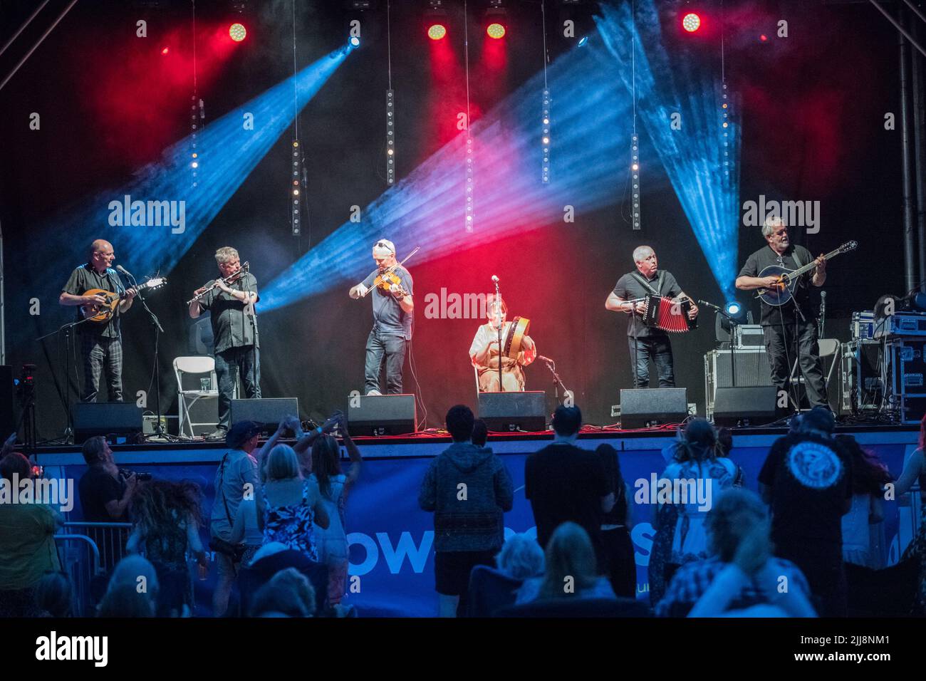 Traditional Irish band, Dervish playng live on stage at the international music festival gate To Southwell. Stock Photo