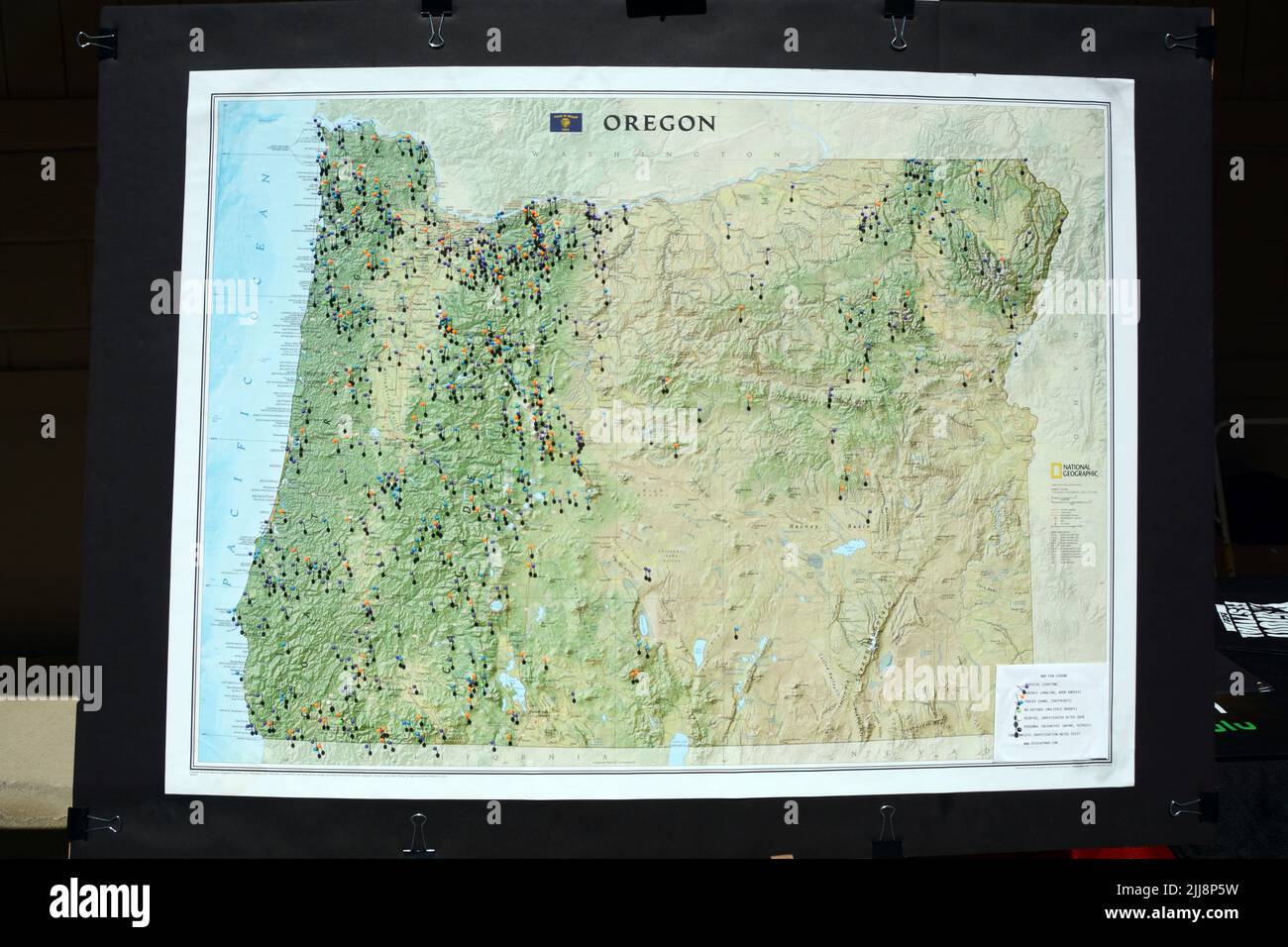 A map with pins showing the locations of Sasquatch sightings in Oregon on display at the Metaline Falls Bigfoot Festival, in Washington State, USA. Stock Photo