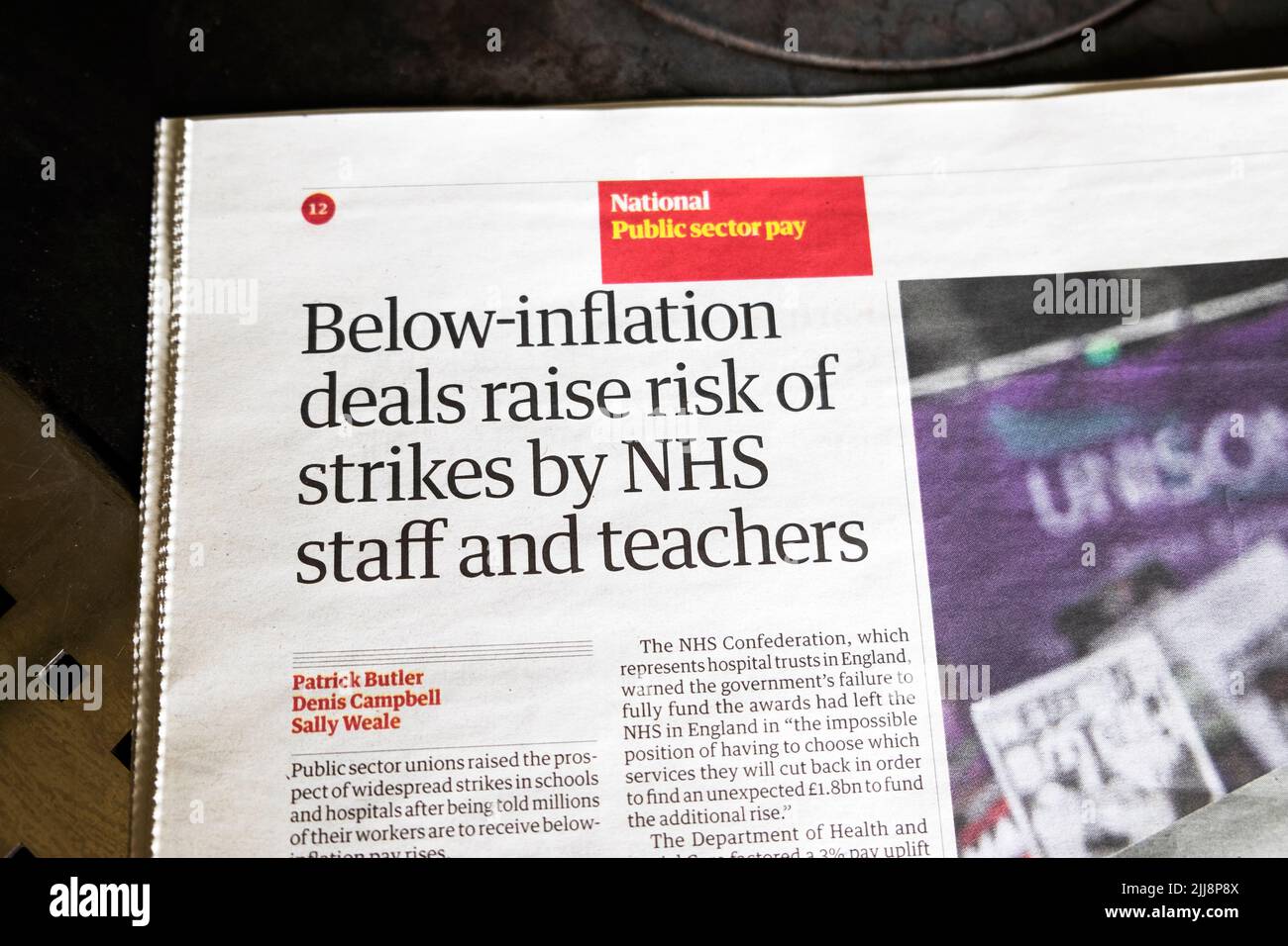 'Below - inflation deals raise risk of strikes by NHS staff and teachers' Guardian newspaper headline NHS schools funding 20 July 2022 London UK Stock Photo