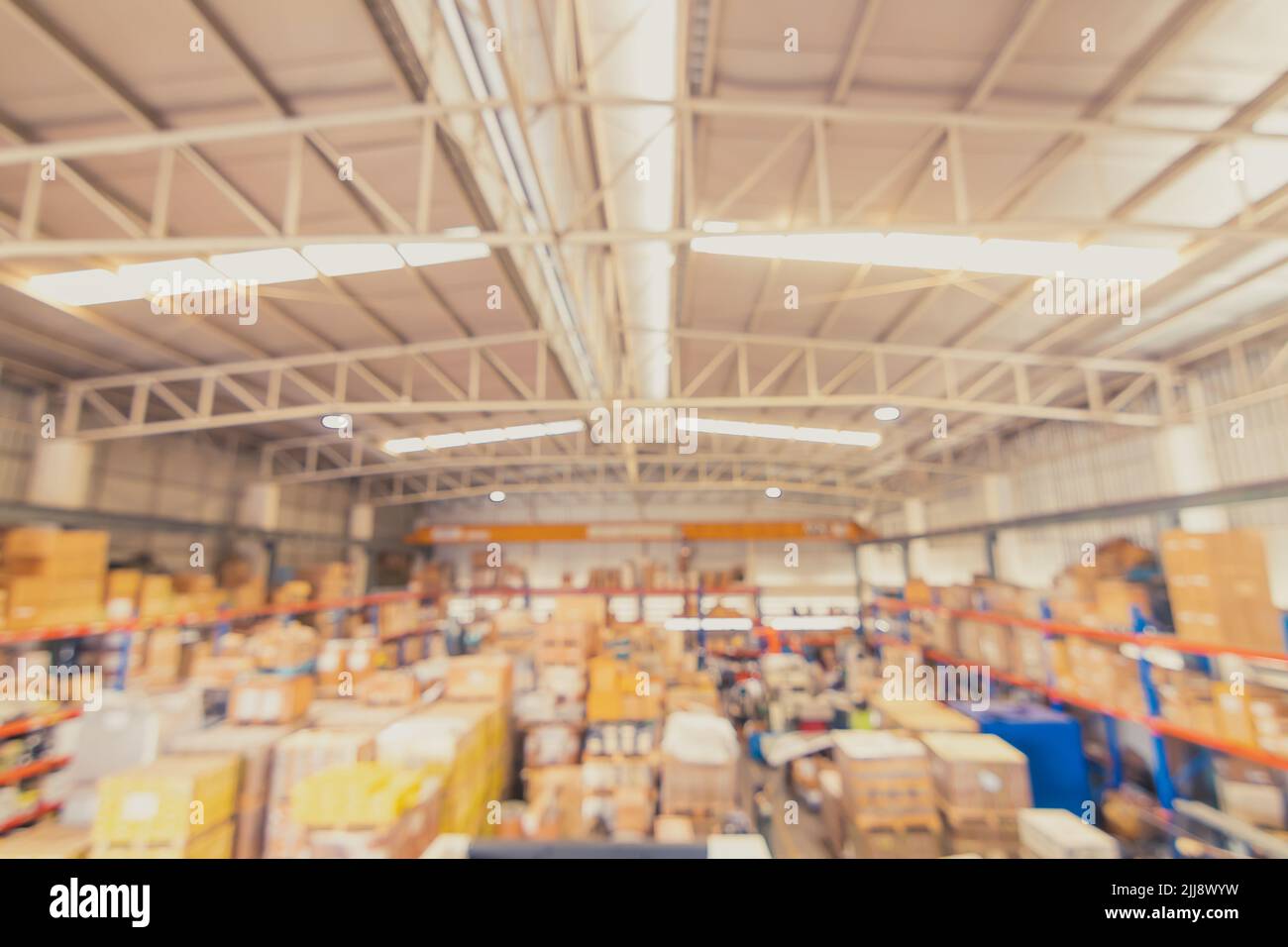 Blur Warehouse goods inventory products stock for logistics shipping background Stock Photo