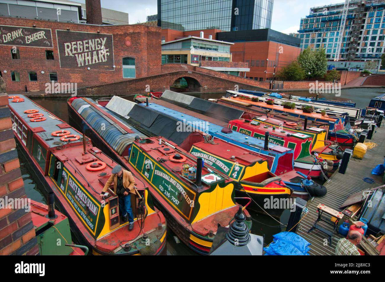 Working Narrow boats in Gas Street Basin Birmingham Stock Photo