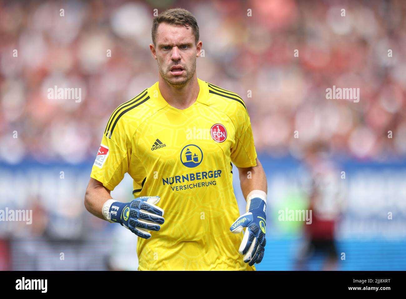 23 July 2022, Bavaria, Nuremberg: Soccer: 2nd Bundesliga, 1. FC Nuremberg - SpVgg Greuther Fürth, 2nd matchday at Max Morlock Stadium. Nuremberg goalkeeper Christian Mathenia. Photo: Daniel Karmann/dpa - IMPORTANT NOTE: In accordance with the requirements of the DFL Deutsche Fußball Liga and the DFB Deutscher Fußball-Bund, it is prohibited to use or have used photographs taken in the stadium and/or of the match in the form of sequence pictures and/or video-like photo series. Stock Photo