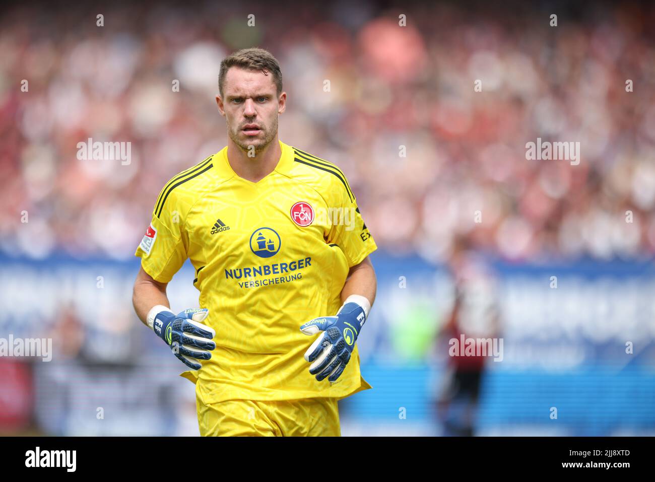 23 July 2022, Bavaria, Nuremberg: Soccer: 2nd Bundesliga, 1. FC Nuremberg - SpVgg Greuther Fürth, 2nd matchday at Max Morlock Stadium. Nuremberg goalkeeper Christian Mathenia. Photo: Daniel Karmann/dpa - IMPORTANT NOTE: In accordance with the requirements of the DFL Deutsche Fußball Liga and the DFB Deutscher Fußball-Bund, it is prohibited to use or have used photographs taken in the stadium and/or of the match in the form of sequence pictures and/or video-like photo series. Stock Photo