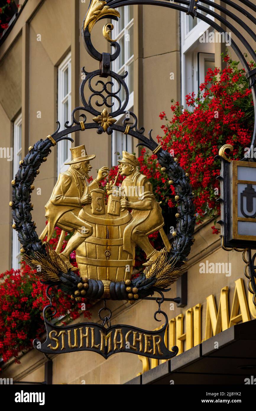 Stuhlmacher restaurant, hanging sign, Münster, Westphalia, North Rhine-Westphalia, Germany Stock Photo