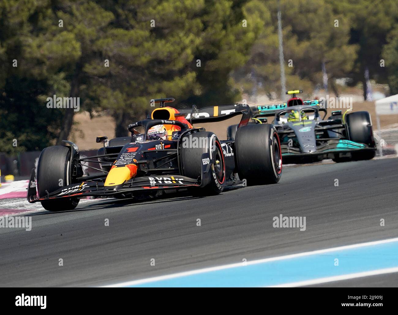 24 July 2022, France, Le Castellet: Motorsport: Formula 1 World Championship, French Grand Prix, race: Max Verstappen (l) from the Netherlands of Team Oracle Red Bull drives ahead of Lewis Hamilton from Great Britain of Team Mercedes. Photo: Hasan Bratic/dpa Stock Photo