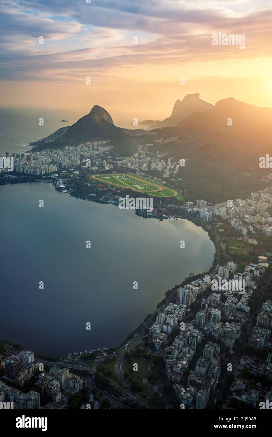 Aerial view of Rodrigo de Freitas Lagoon at Sunset with Dois Irmaos Hill and Pedra da Gavea - Rio de Janeiro, Brazil Stock Photo