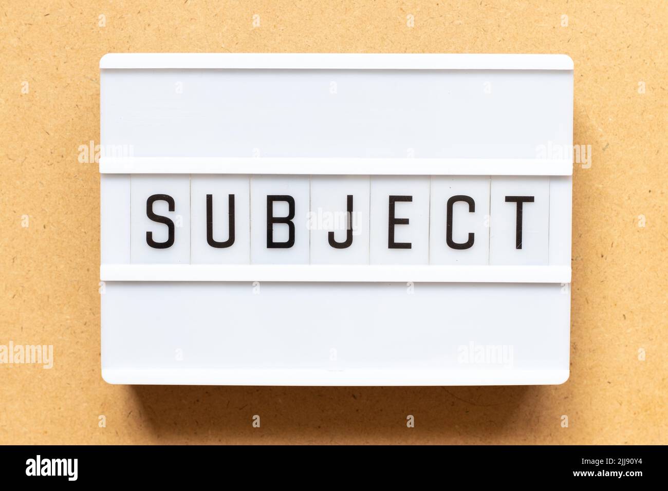 Lightbox with word subject on wood background Stock Photo