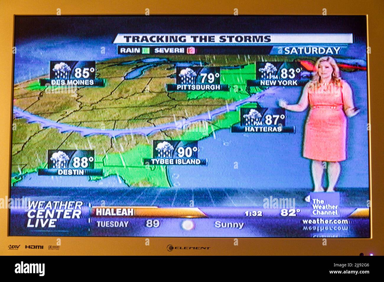 Miami Beach Florida,television set TV flat screen monitor,The Weather Channel,woman on air,meteorologist giving forecast tracking storm cold front map Stock Photo