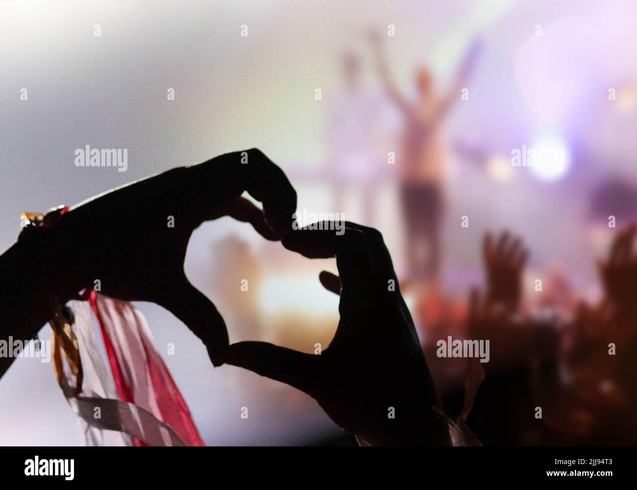 crowd partying stage lights live concert summer music festival Stock