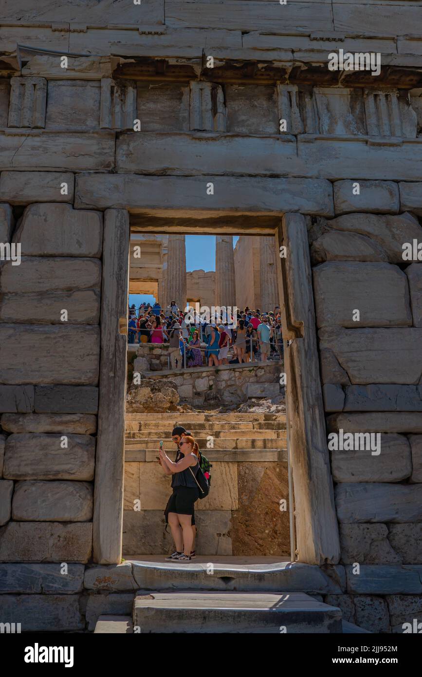 ATHENS, GREECE - MAY 21, 2022: Entrance to Athena Nike temple on Acropolis, landmark of Athens. Stock Photo