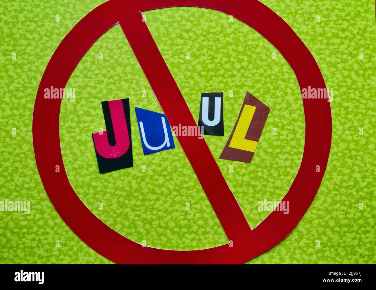 Juul Electronic  using cut-out paper letters in the ransom note effect typography inside The International NO Symbol, USA Stock Photo
