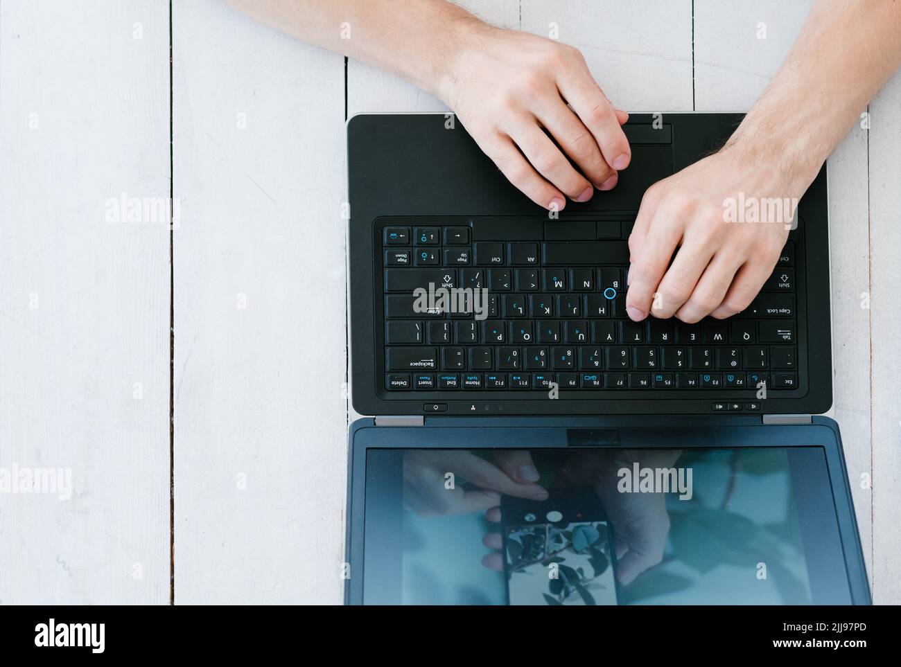 blogger social media man laptop hands keyboard Stock Photo