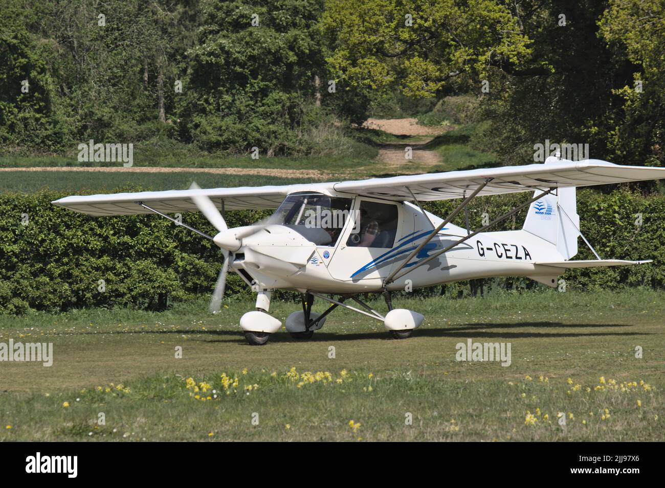 An Ikarus C42 light aircraft at Popham Airfield in Hampshire for the Microlight Trade Fair 2022 Stock Photo