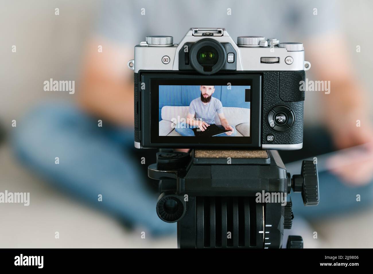 blogger shoot video man camera screen equipment Stock Photo Alamy