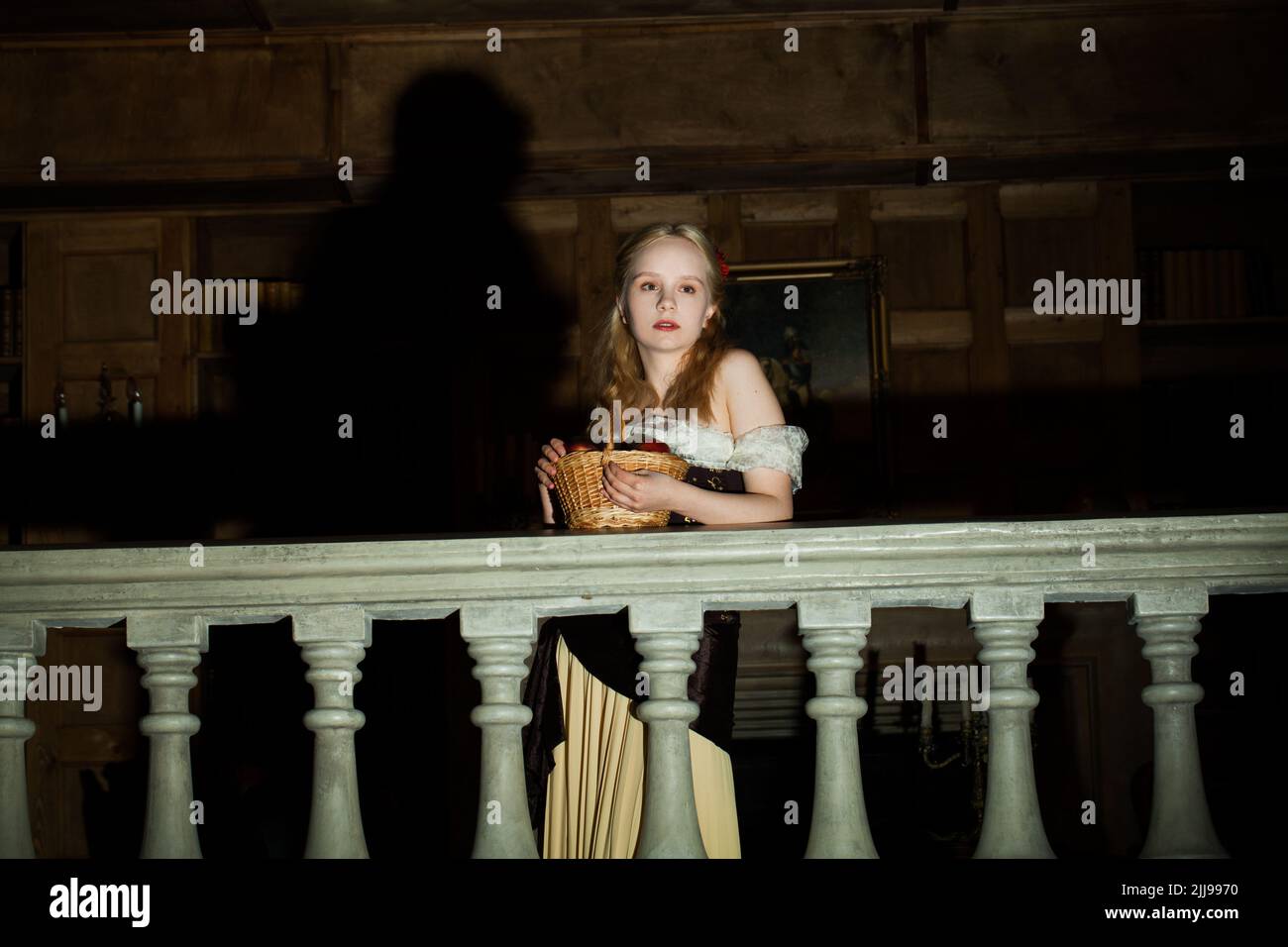 Actress woman in stage light on the balcony Stock Photo