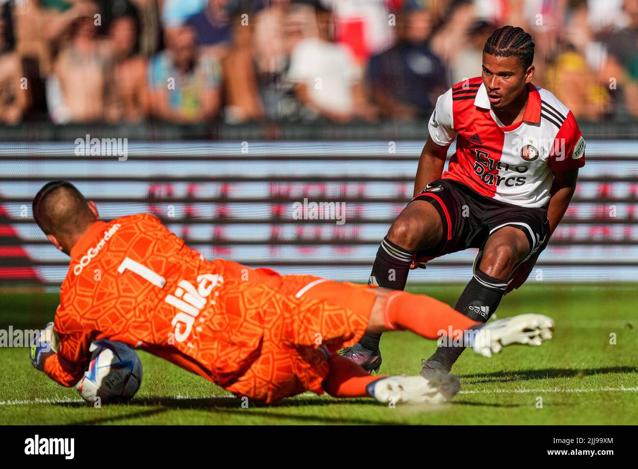 Rotterdam, Netherlands. 24 July 2022, Rotterdam - Olympique Lyon keeper Anthony Lopes, Denzel Hall of Feyenoord during the match between Feyenoord v Olympique Lyon at Stadion Feijenoord De Kuip on 24 July 2022 in Rotterdam, Netherlands. (Box to Box Pictures/Tom Bode) Stock Photo