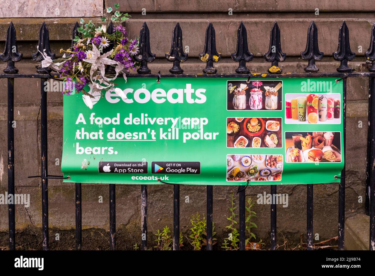 An advertisement for the ecoeats grocery delivery app. Stock Photo