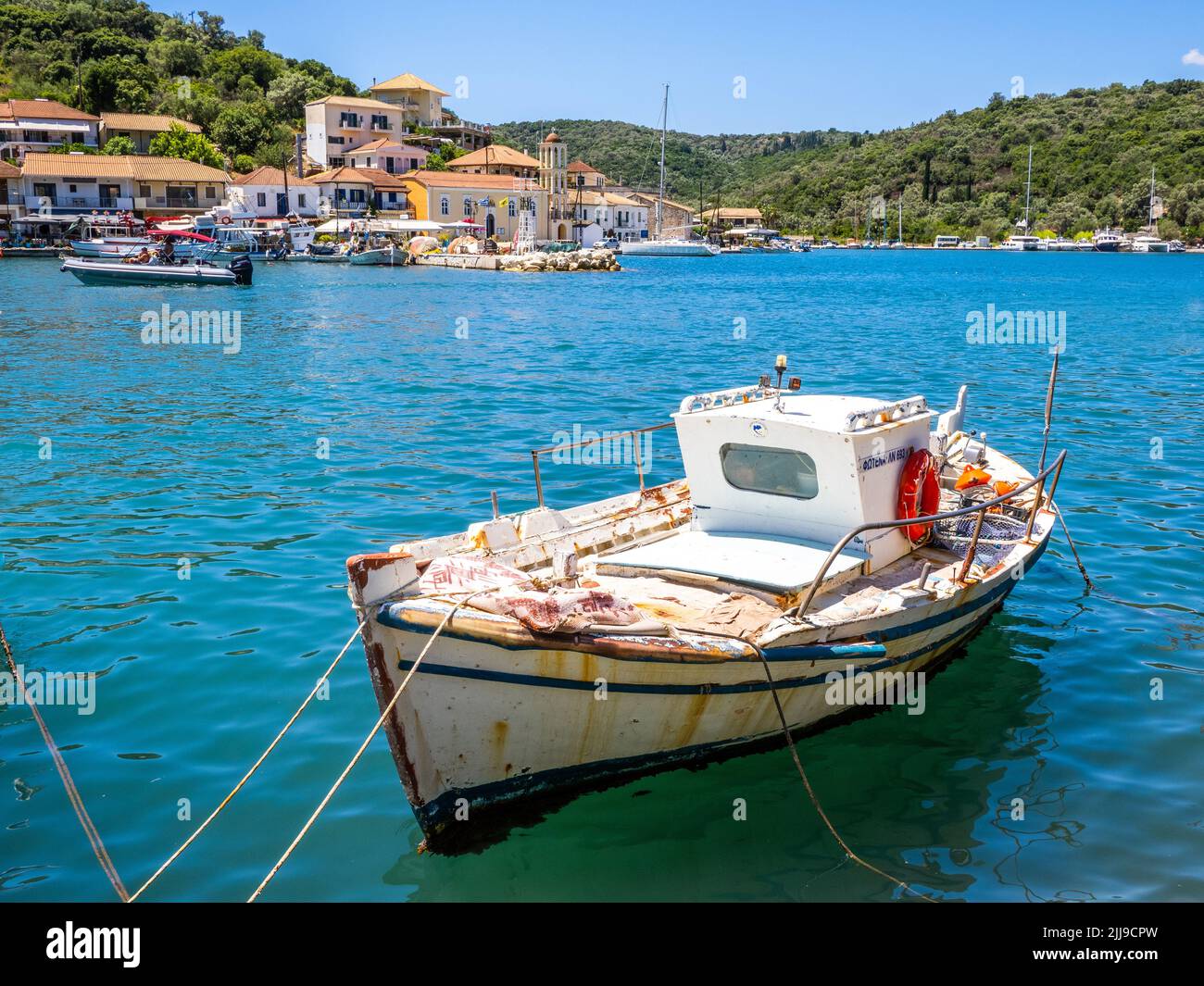 Boats in Vathy harbour on the island of Meganissi in the Ionian Islands of Northern Greece Stock Photo