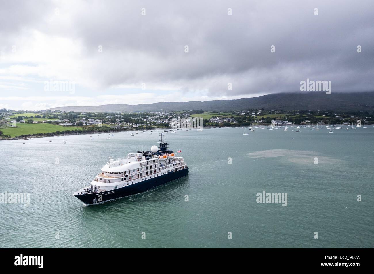 Schull, West Cork, Ireland. 24th July, 2022. Expedition ship 'Island Sky' called at Schull in West Cork last evening. She sailed at 5.30 this evening heading for the Isles of Scilly, with 112 passengers and 70 crew on board. Credit: AG News/Alamy Live News Stock Photo