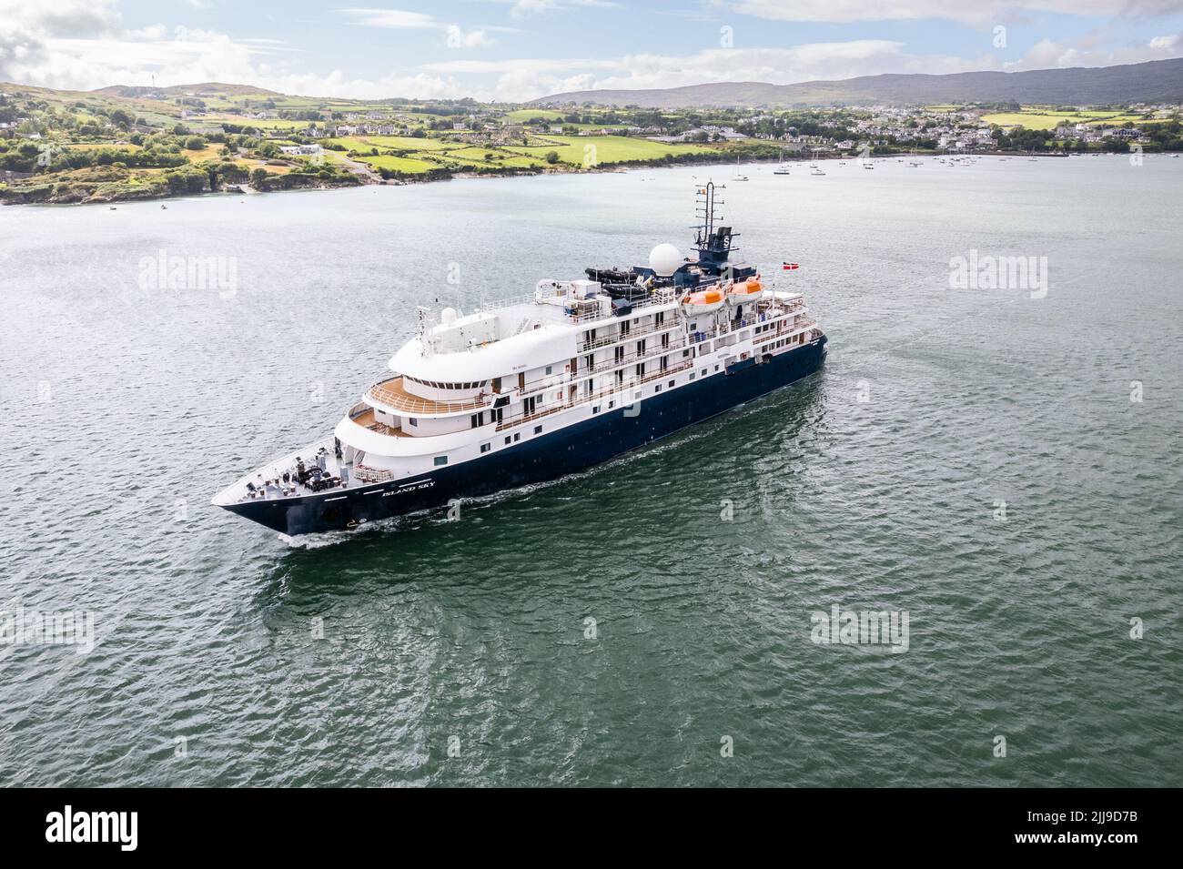 Schull, West Cork, Ireland. 24th July, 2022. Expedition ship 'Island Sky' called at Schull in West Cork last evening. She sailed at 5.30 this evening heading for the Isles of Scilly, with 112 passengers and 70 crew on board. Credit: AG News/Alamy Live News Stock Photo