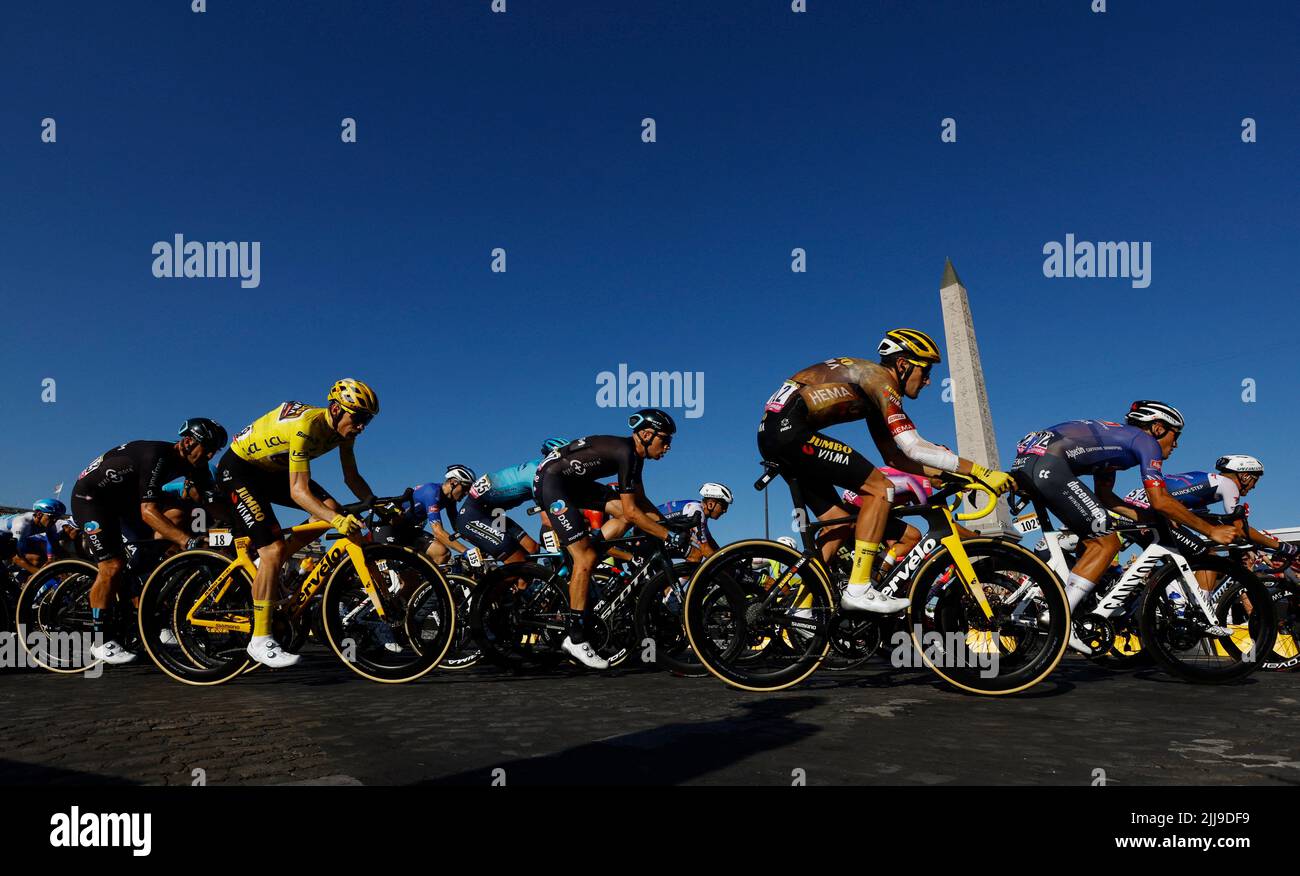 Cycling - Tour de France - Stage 21 - Paris La Defense Arena to Champs-Elysees - France - July 24, 2022 Jumbo - Visma's Jonas Vingegaard and Jumbo - Visma's Tiesj Benoot in action with riders during stage 21 REUTERS/Gonzalo Fuentes Stock Photo