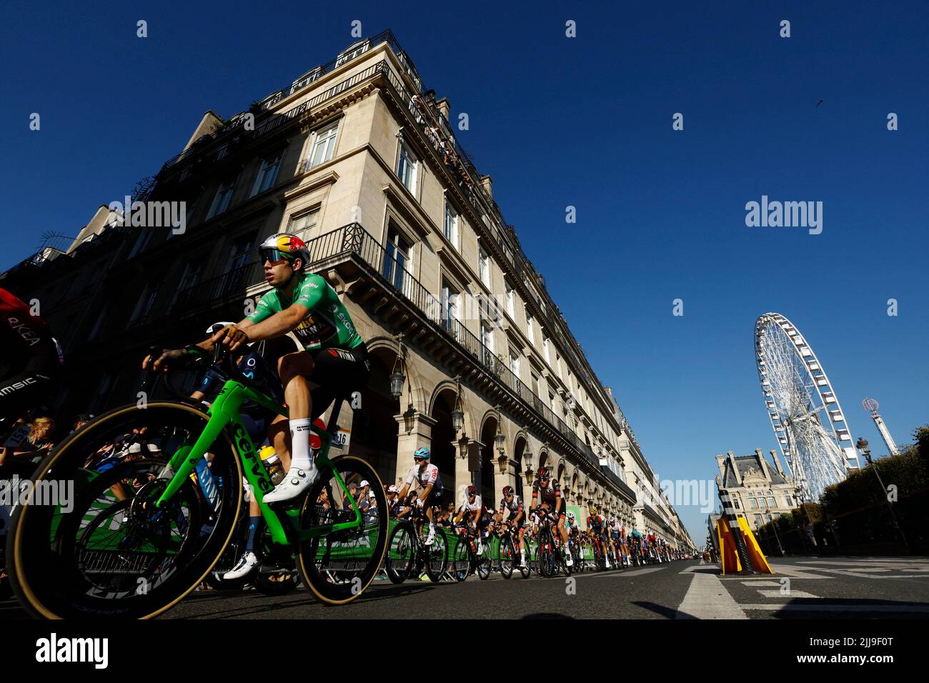 Cycling - Tour de France - Stage 21 - Paris La Defense Arena to Champs-Elysees - France - July 24, 2022 Jumbo - Visma's Wout Van Aert in action with riders during stage 21 REUTERS/Gonzalo Fuentes Stock Photo