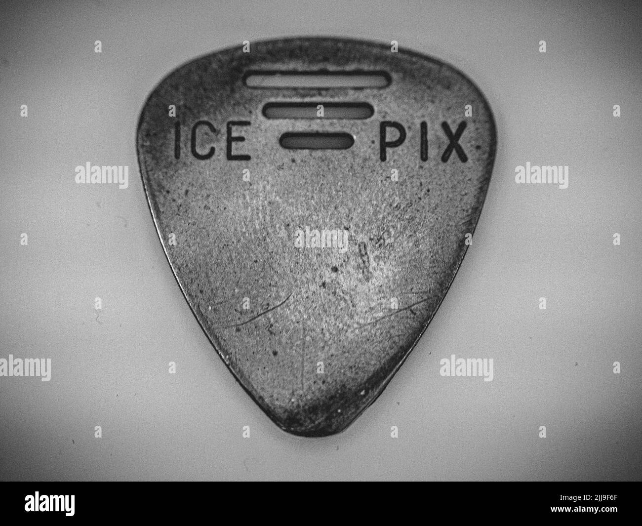 A Metal Guitar Pick, Black and White Stock Photo Alamy