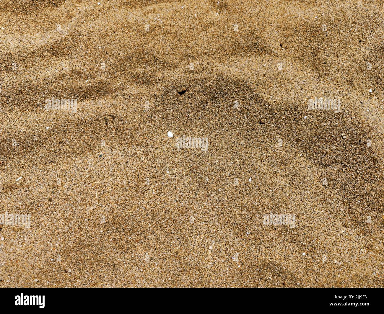 Perfect background shot for designers of a clear beautiful brown sandy beach Stock Photo