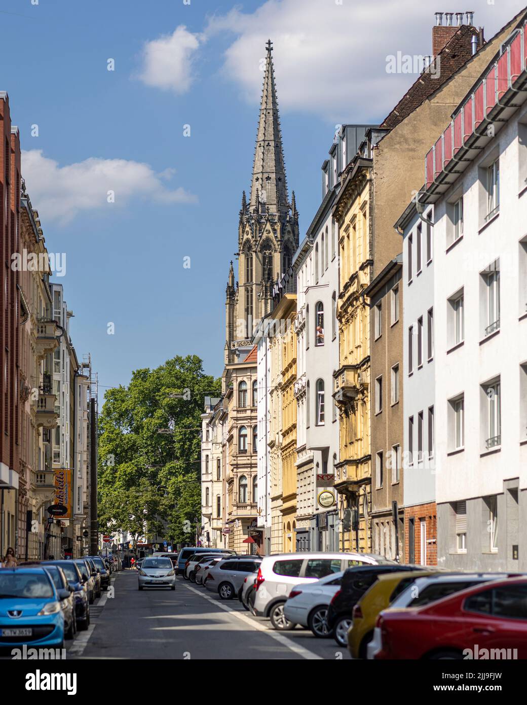 Modern and historical buildings in Cologne on a bright summer day Stock Photo