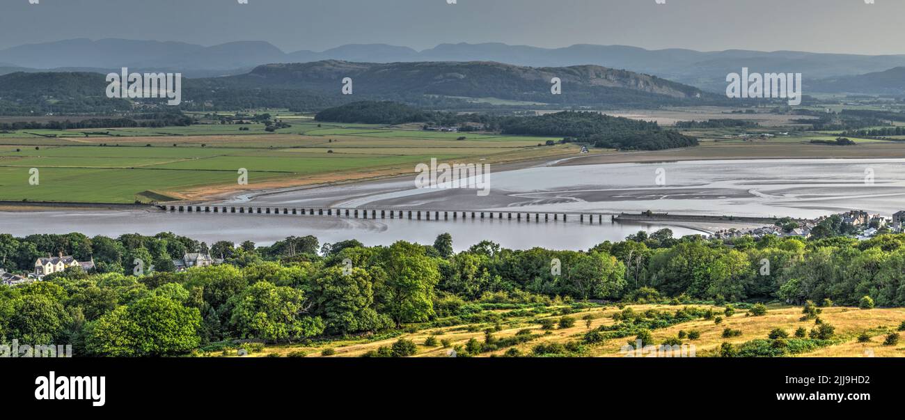 Panoramic view of the Kent estuary and railway viaduct from Arnside Knott, Cumbria, UK, with Lake District hills in the background Stock Photo