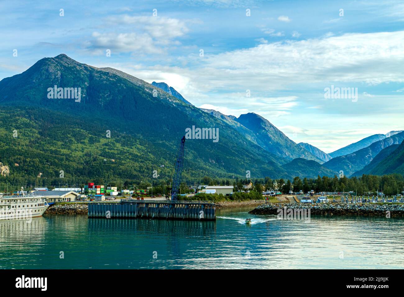 Skagway Harbor showing the docks and city, backdropped by mountain
