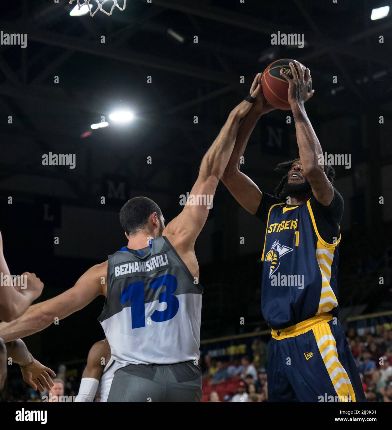 Edmonton, Alberta, Canada. 23rd July, 2022. MARLON JOHNSON (11) of the Edmonton Stingers is fouled well shooting during a regular season Cebl match up where the Edmonton Stingers hosted the Guelph Nighthawks at Edmonton Expo Centre in Edmonton, Alberta. (Credit Image: © Matthew Helfrich/ZUMA Press Wire) Stock Photo