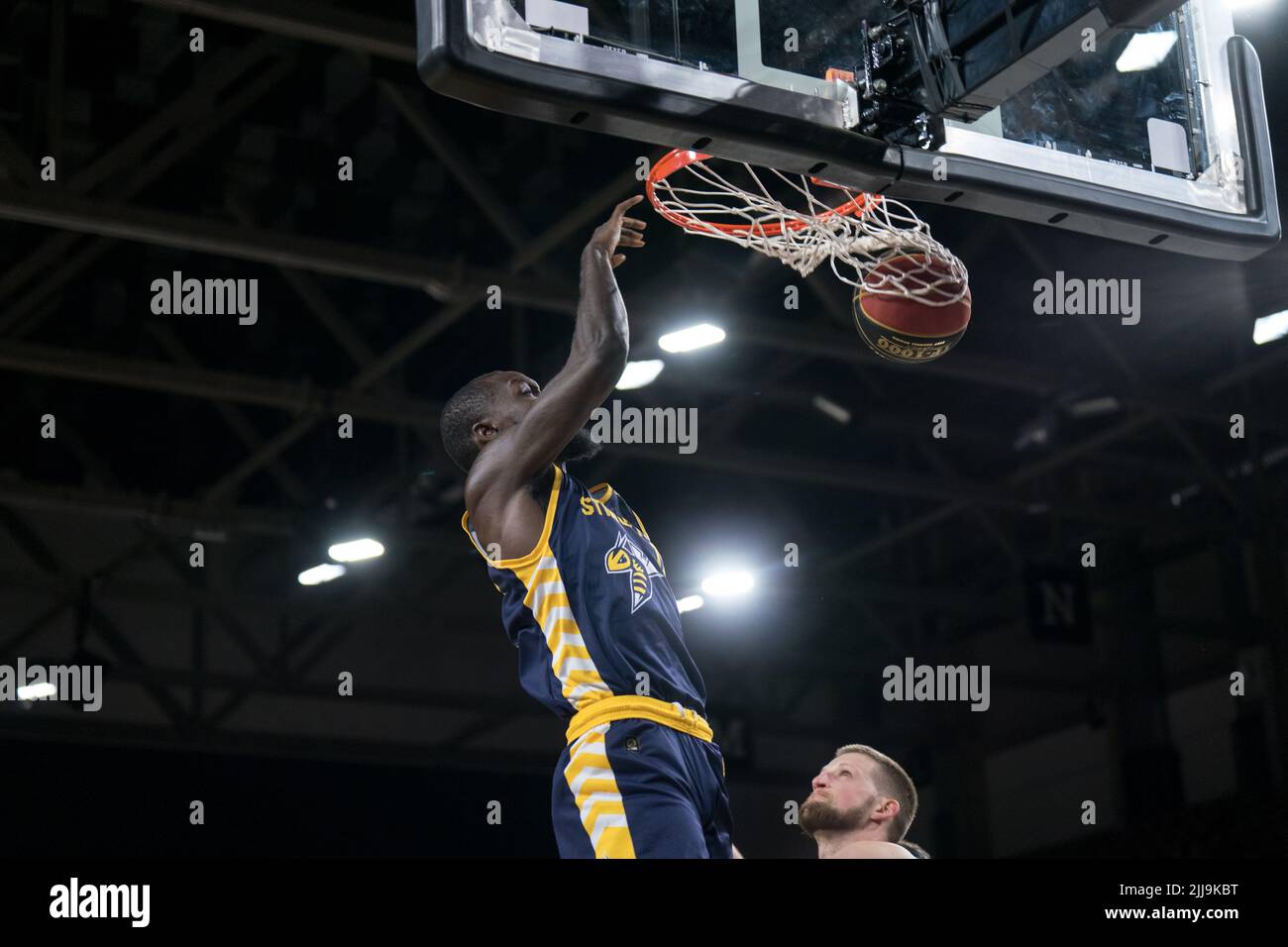 Edmonton, Alberta, Canada. 23rd July, 2022. TRAHSON BURRELL (12) of the Edmonton Stingers dunks the ball during a regular season Cebl match up where the Edmonton Stingers hosted the Guelph Nighthawks at Edmonton Expo Centre in Edmonton, Alberta. (Credit Image: © Matthew Helfrich/ZUMA Press Wire) Stock Photo