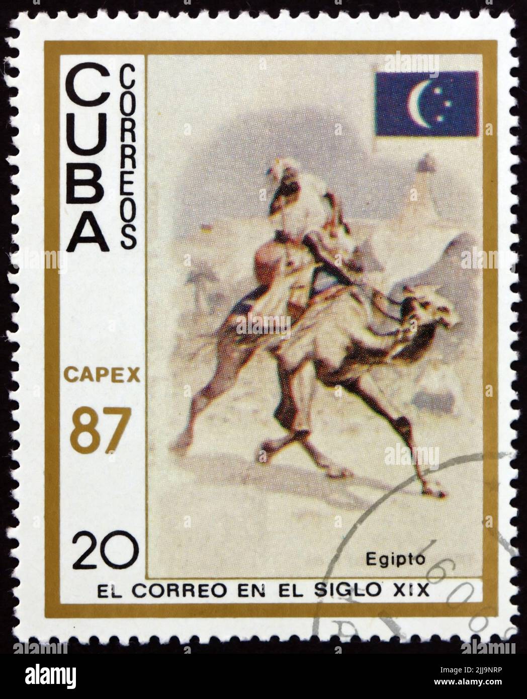 CUBA - CIRCA 1987: a stamp printed in Cuba shows messenger riding camel from Egypt, 1879 mail carrier pictured on cigarette cards, circa 1987 Stock Photo