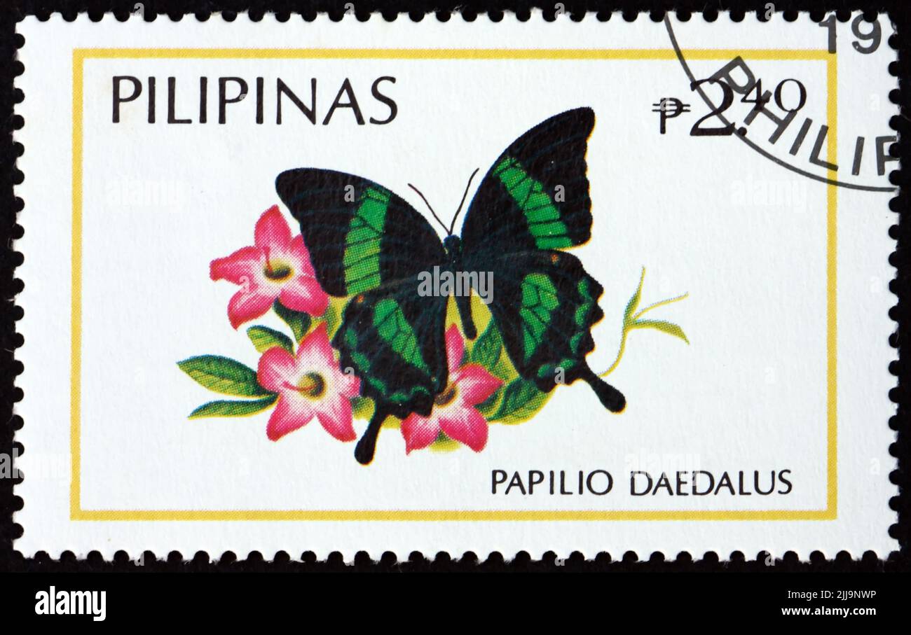 PHILIPPINES - CIRCA 1984: a stamp printed in Philippines shows emerald swallowtail, papilio daedalus, is a butterfly native to Philippines, circa 1984 Stock Photo