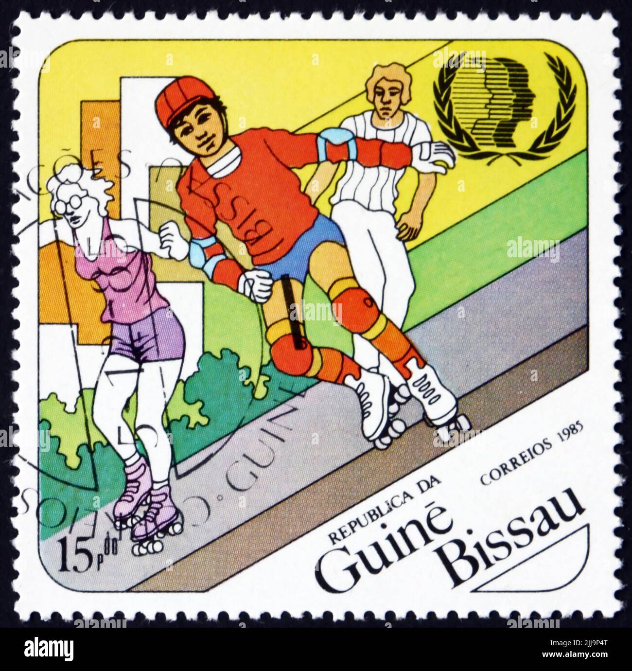 GUINEA-BISSAU - CIRCA 1985: a stamp printed in Guinea-Bissau shows rollerskating, International Youth Year, circa 1985 Stock Photo