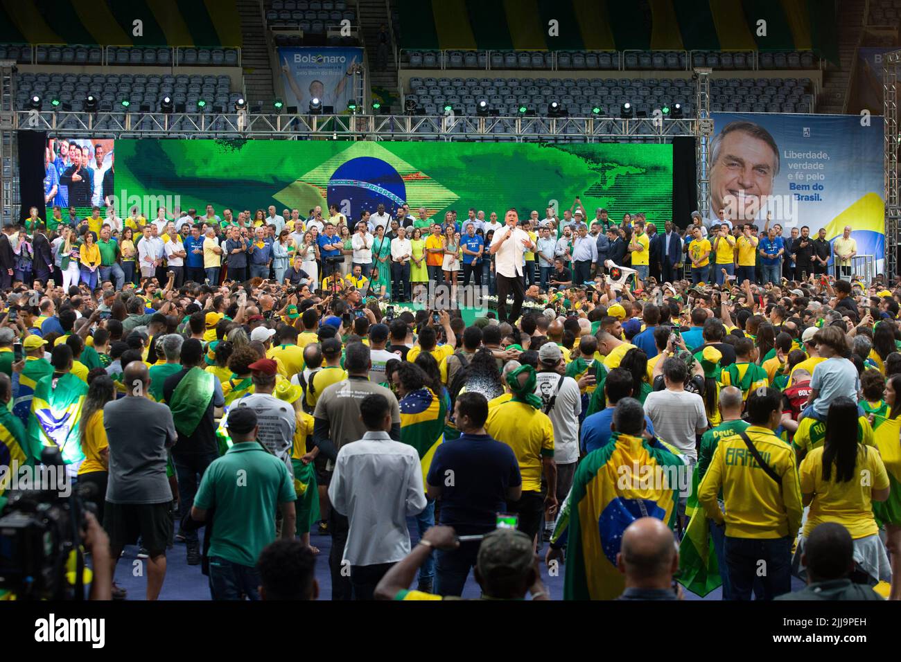 Rio De Janeiro, Brazil. 24th July, 2022. Brazilian President Jair Bolsonaro and his wife Michelle Bolsonaro stand on stage during the official campaign launch for his re-election. Brazil's general election is set for Oct. 2, 2022. Credit: Fernando Souza//dpa/Alamy Live News Stock Photo