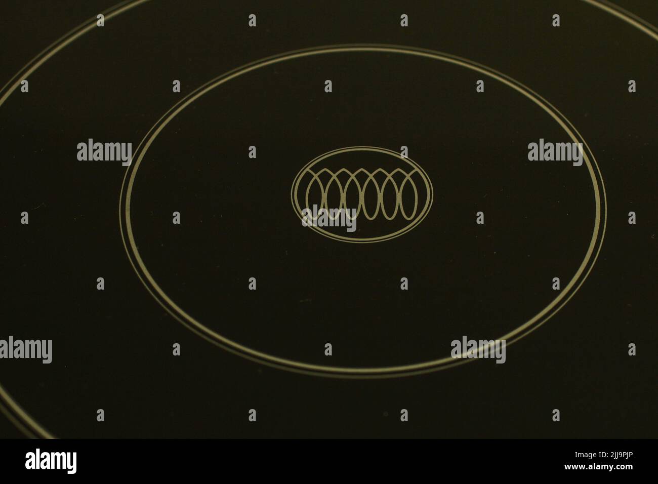 The symbol of the induction cooker on the ceramic surface of the stove