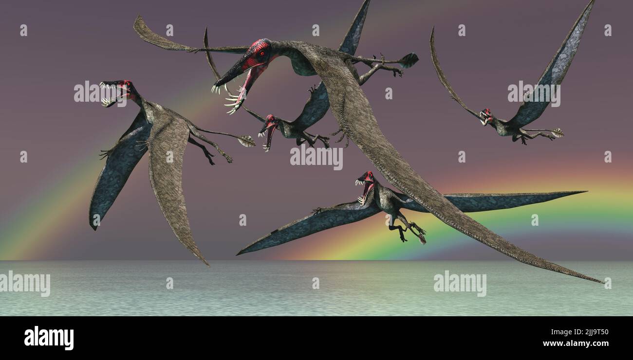A flock of Dorygnathus Pterosaur reptiles fly over the sea during the Jurassic Period of Europe. Stock Photo