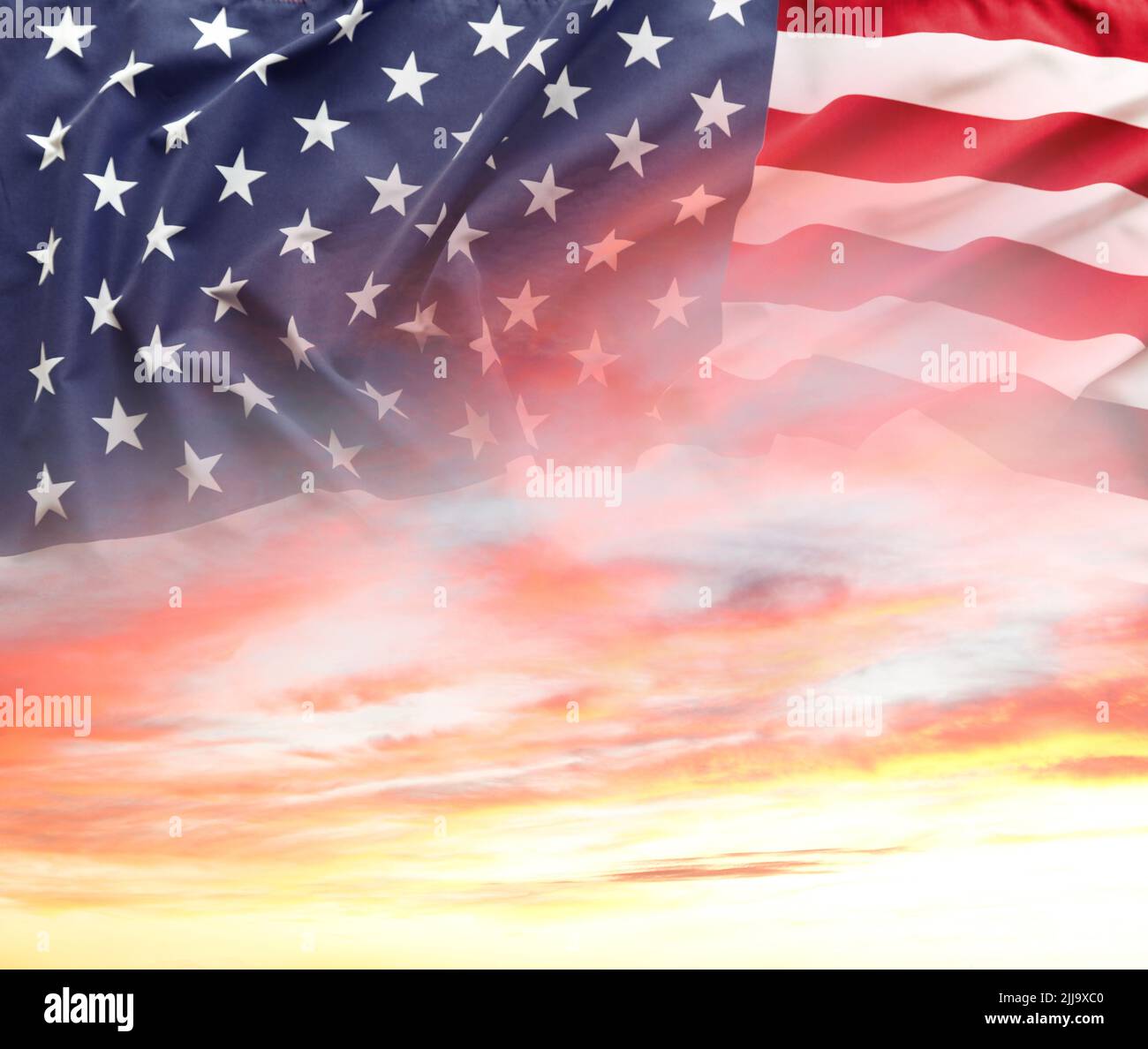 American flag in sunny sky Stock Photo