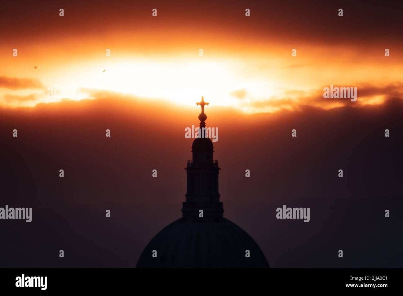 London, UK. 24th July, 2022. UK Weather: Dramatic evening sun over St. Paul's Cathedral. Credit: Guy Corbishley/Alamy Live News Stock Photo