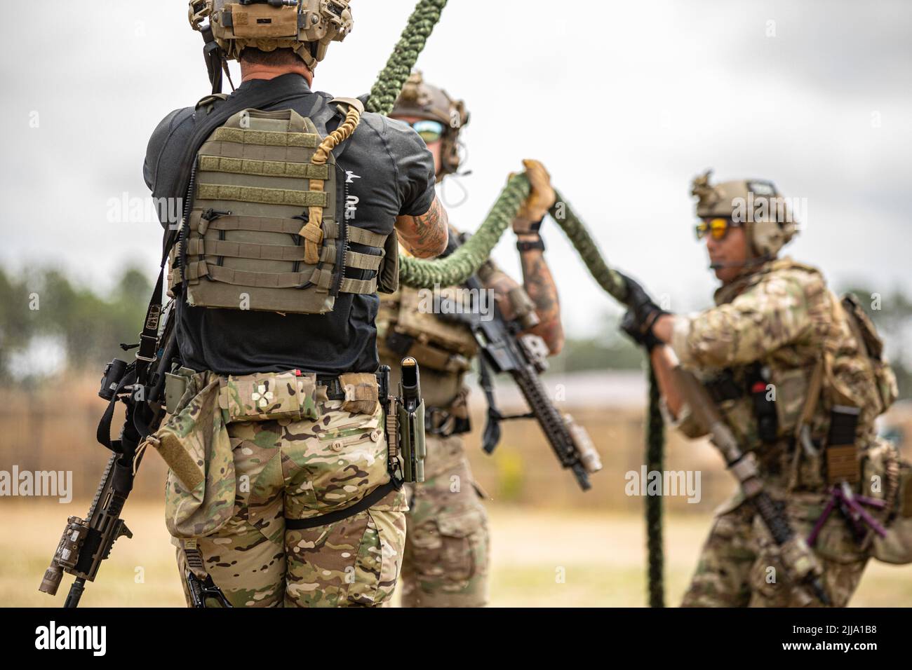 Us Army Special Operations Soldiers Conduct Fast Rope Insertion Training Aboard A Black Hawk 