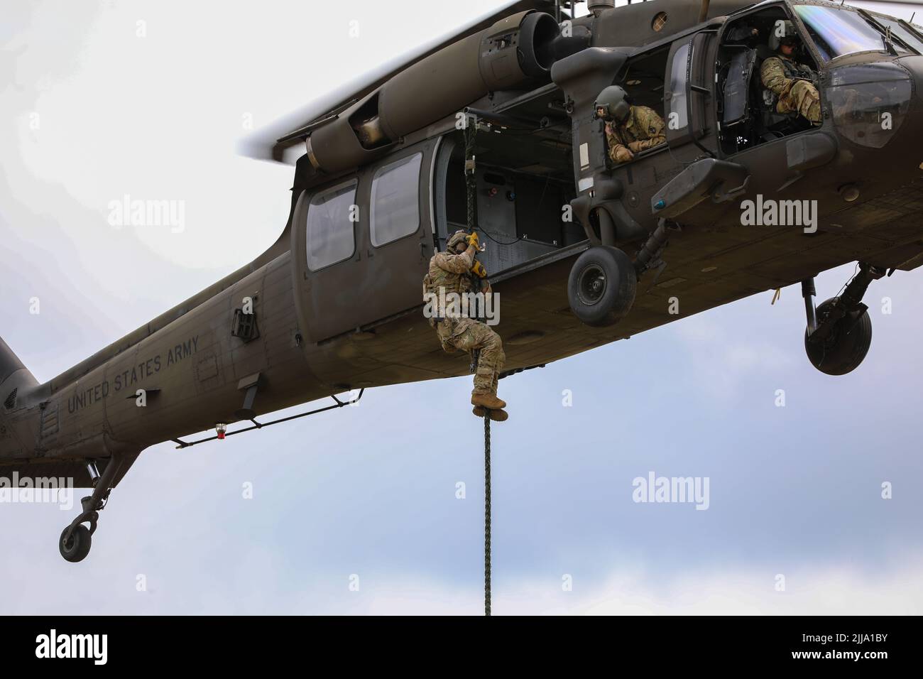 U.S. Army Special Operations Soldeir conduct fast rope insertion ...