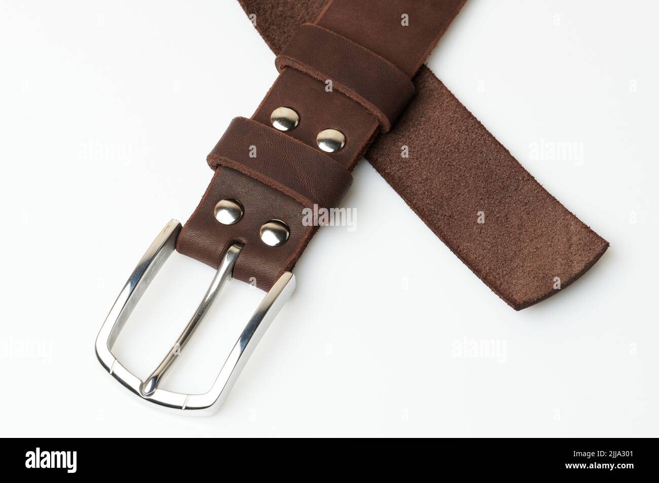 Metal shiny leather belt waistband close up view isolated Stock Photo