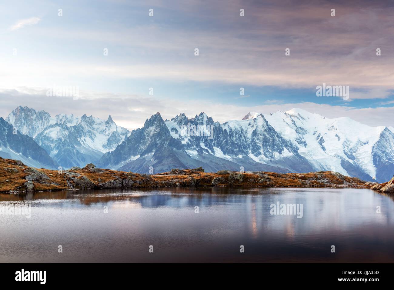 Incredible view of clear water and sky reflection on Chesery lake (Lac