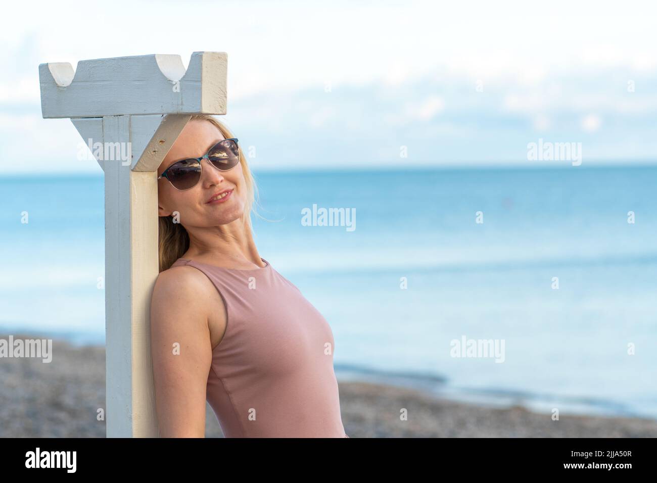Woman happy glasses girl sea river hair selfie shot outdoor, from young tourist in pretty for face relax, resort portrait. Taking leisure picture, Stock Photo