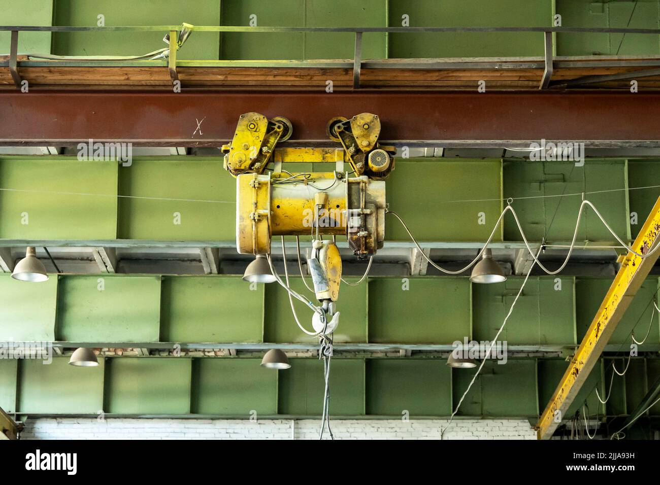 powerful electric winch at the factory. Horizontal beam crane Stock